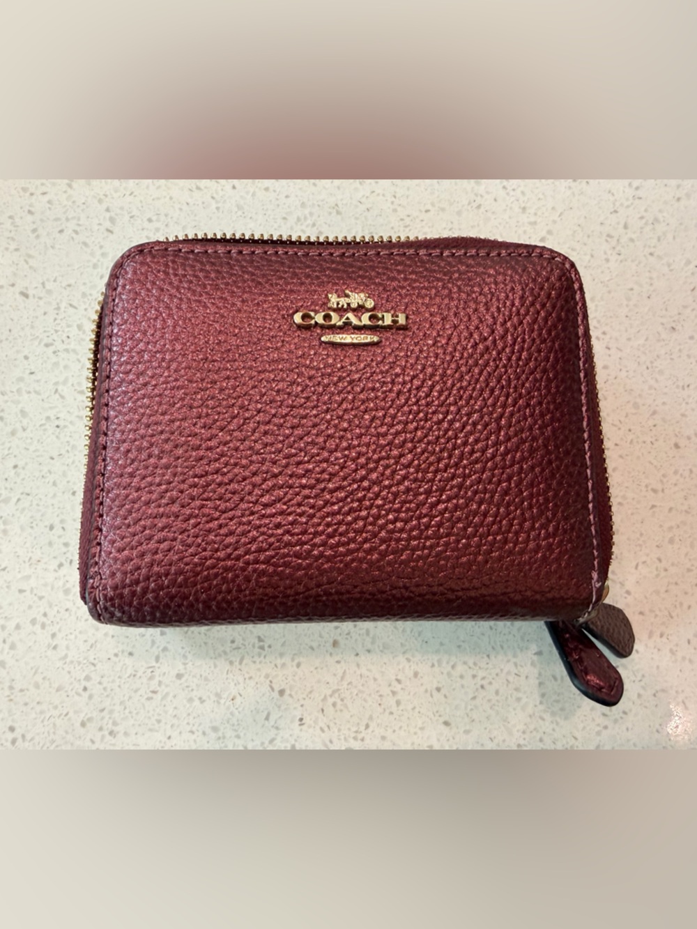Coach billfold in metallic wine